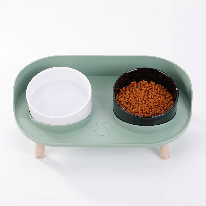 Top view of elevated double feeder on wooden legs — removable bowls.
