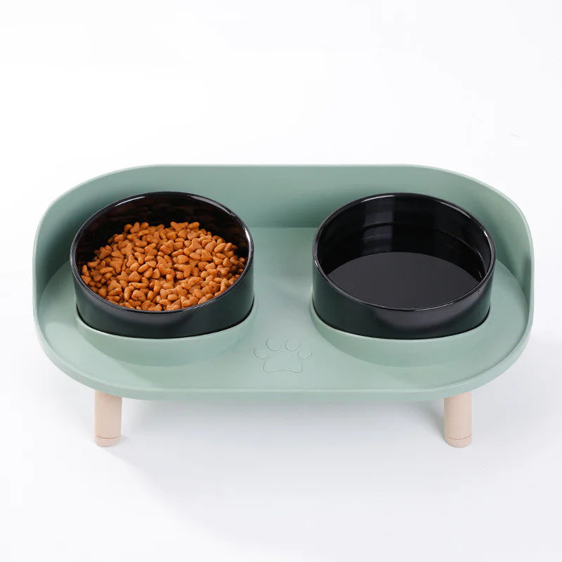 Green base with black bowls — elevated double feeder.