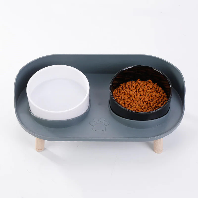 Dark gray base with white and black bowls — raised double feeder.