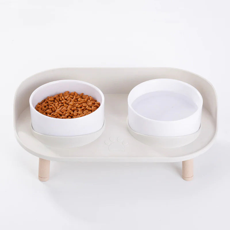 Top view — white bowls on raised stand, modern design.
