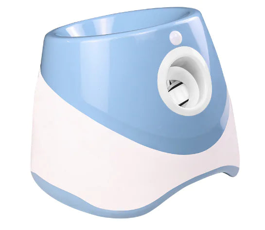 Blue automatic ball launcher—front view showing circular ball outlet and smooth hopper.